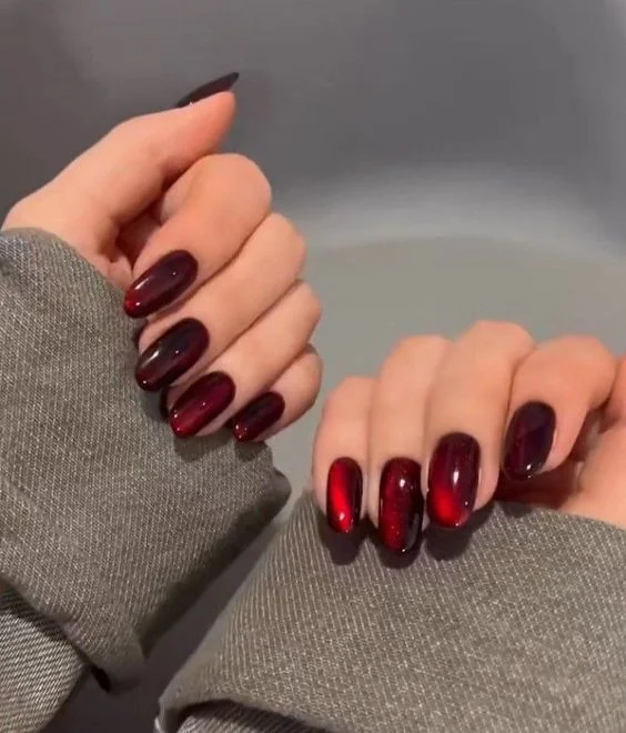 style nail art maroon cat eye