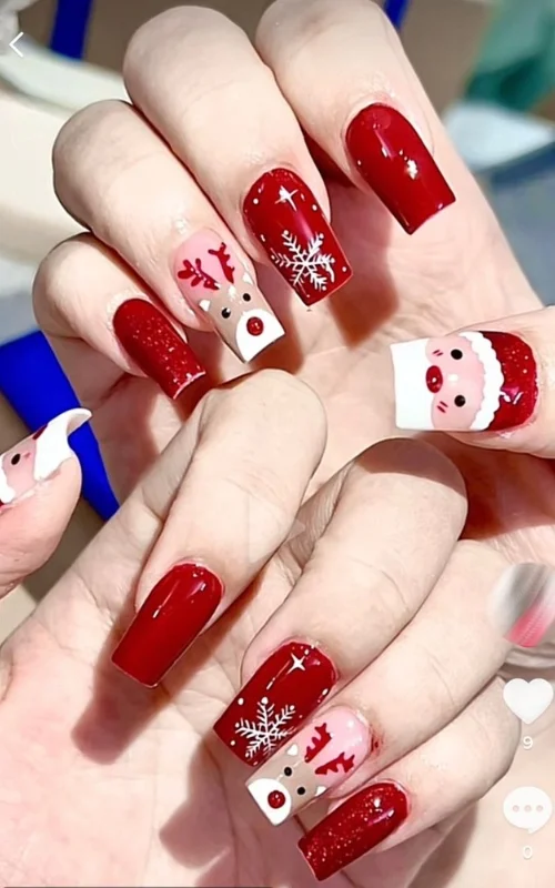 ide design Nail art warna merah natal